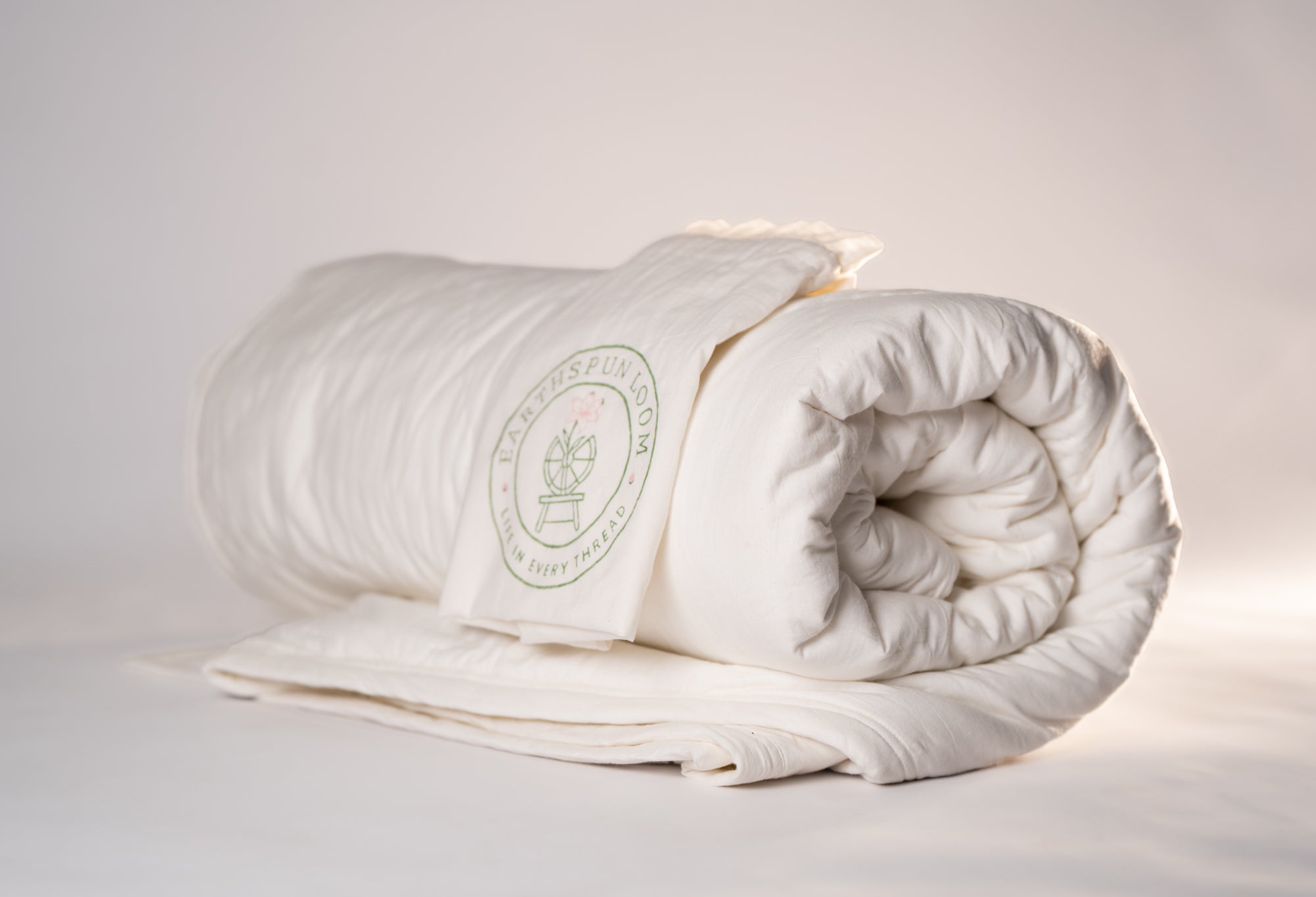Organic cambric cotton comforter in leche linen creamy white color