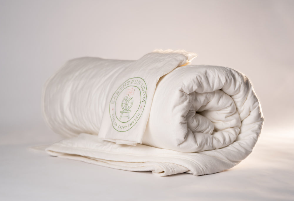 Organic cambric cotton comforter in leche linen creamy white color