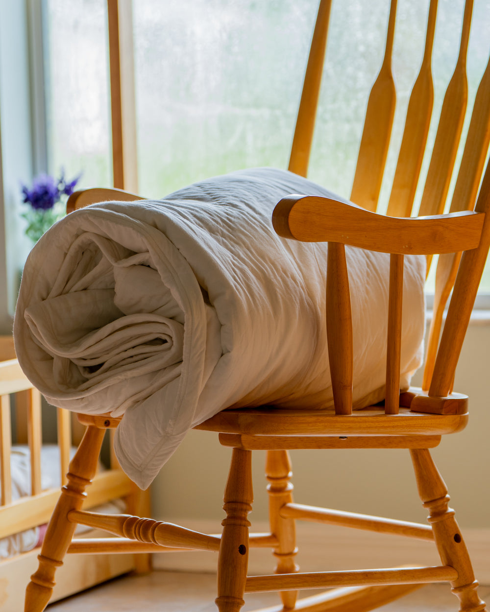 Layered organic cotton bedding with cambric cotton comforter