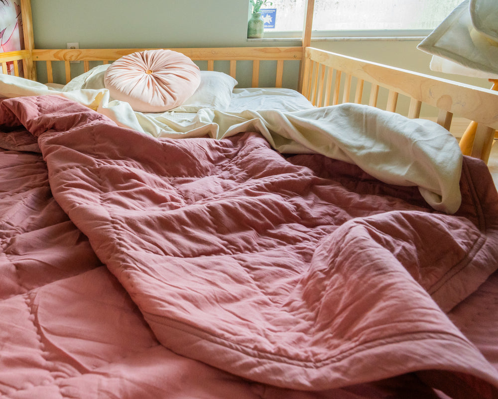Organic cotton comforter on children’s bed, non-toxic bedding